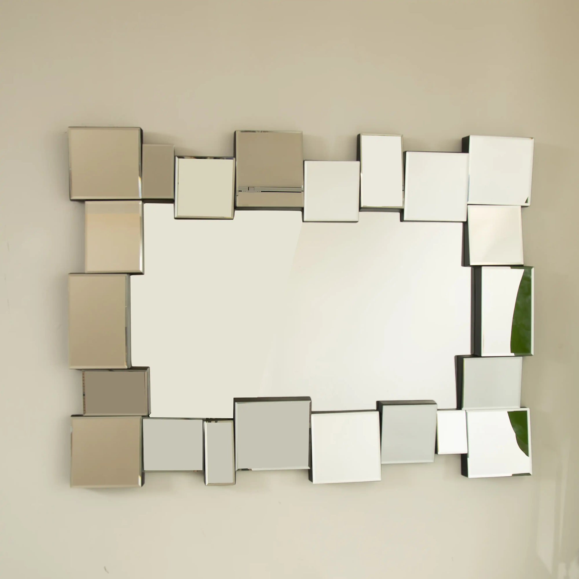 Front view of a 39 x 29 modern decorative mirror with 3D geometric beveled frame | Ace Decor
