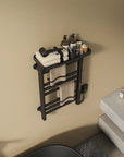 Top view of black Thervon Series towel warmer nearby vanity, 18 x 27 size with shelf holding towels and toiletries | Ace Decor