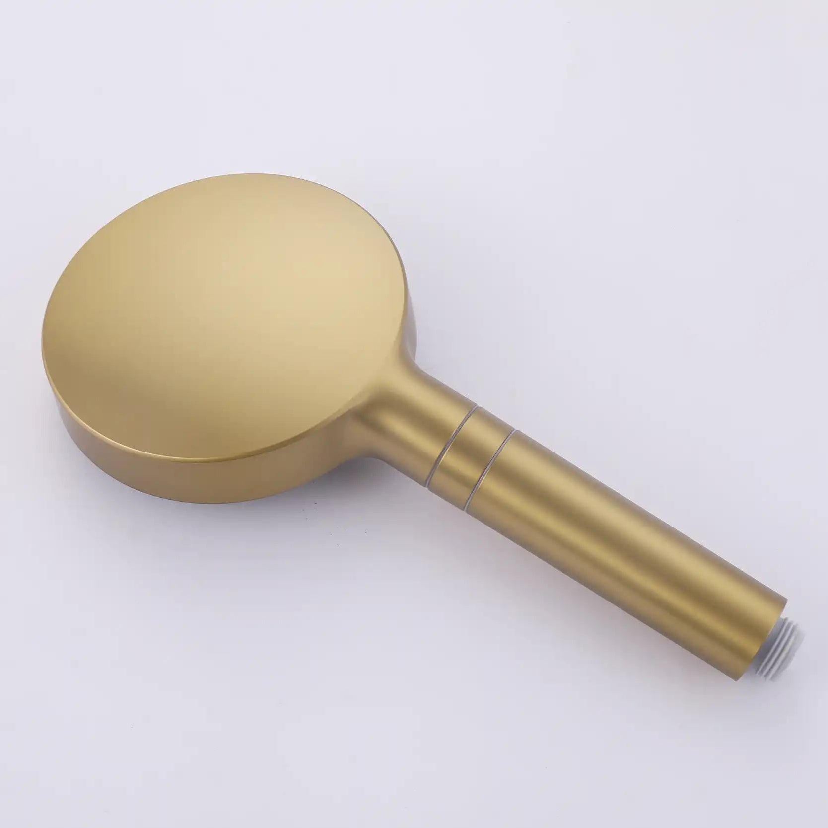 Rear view of the brushed gold handheld shower head.