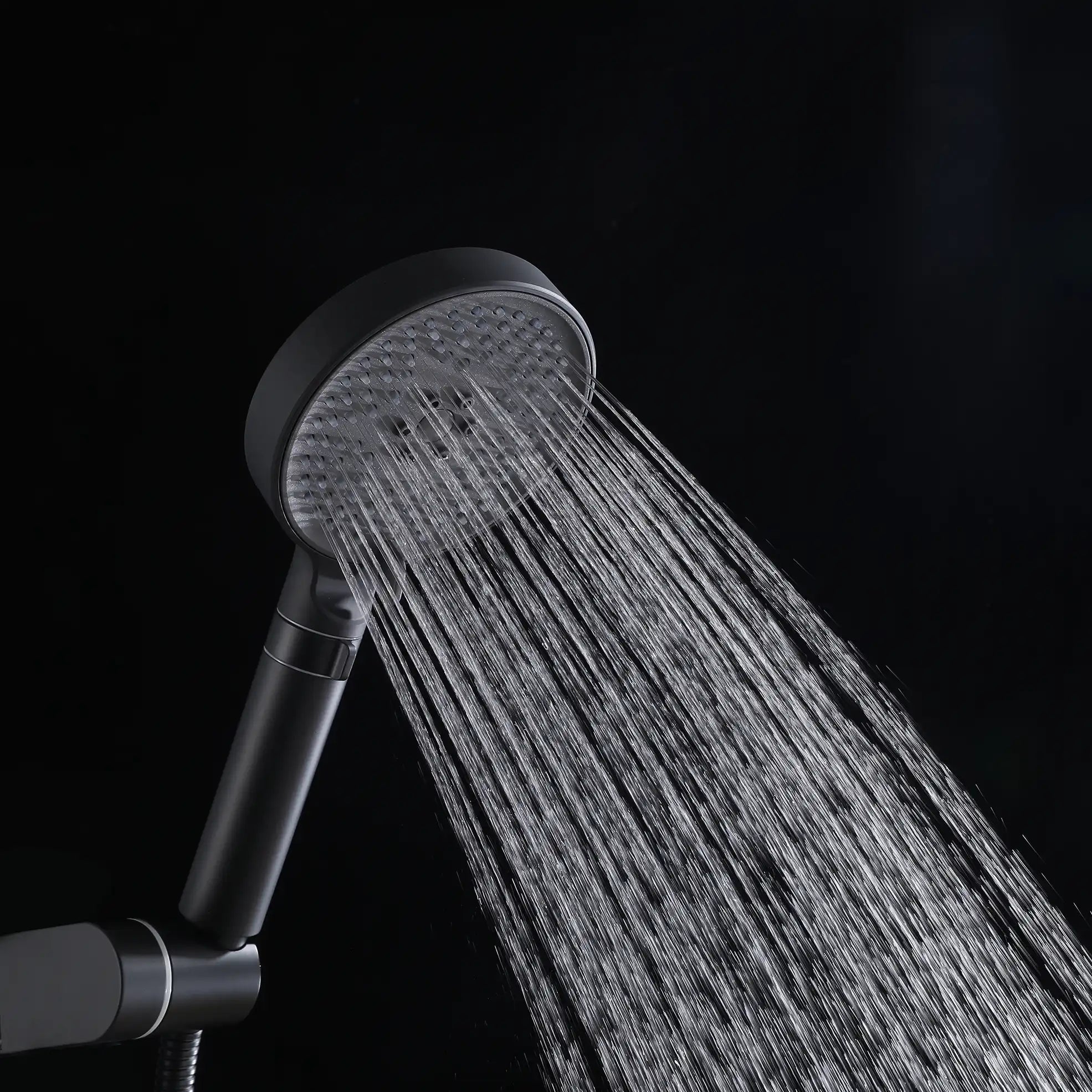 Matte black handheld shower head with a soft, relaxing rainfall spray.