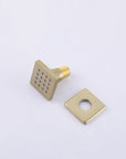 Adjustable brushed gold body jets for targeted shower coverage.