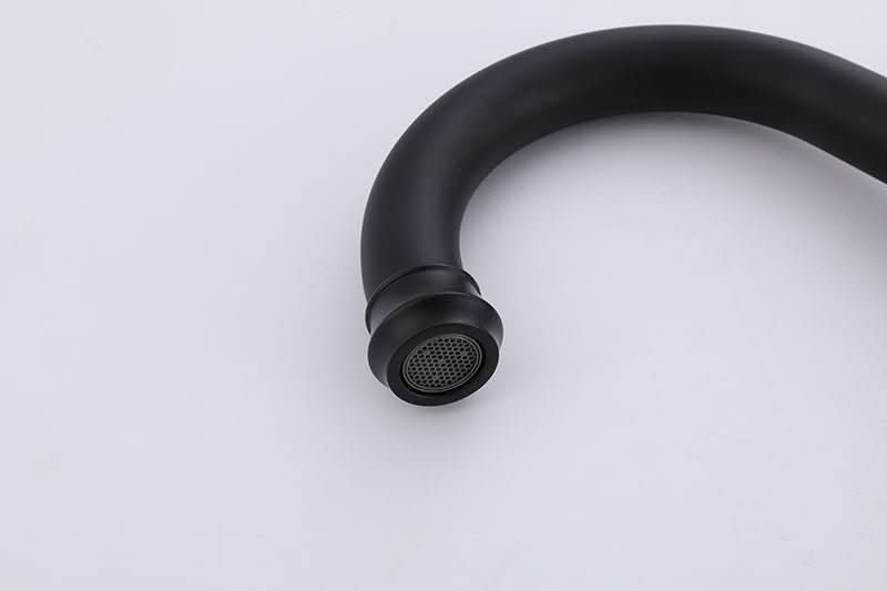 Close-up of VALMIRA Matte Black Sink Faucet spout with aerator detail for smooth flow。