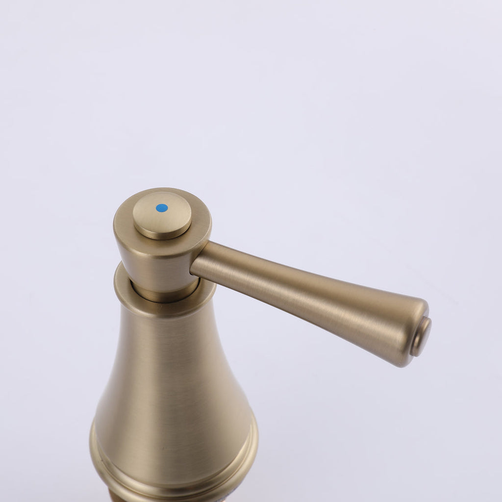 VALMIRA Brushed gold sink faucet handle with blue dot.