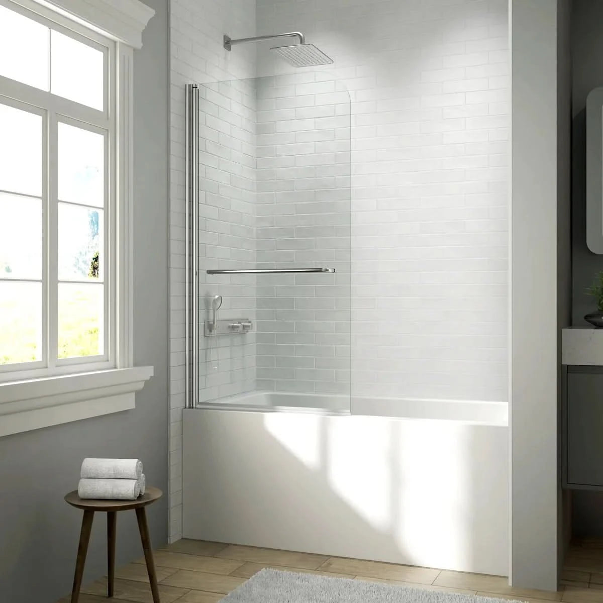 A sleek frameless tub shower door with a chrome towel bar, set against clean white subway tiles for a modern bath look. | ACE DECOR