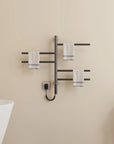 Gray Orven Series towel heater rack 16 x 27 with towels hanging on wall-mounted design | Ace Decor