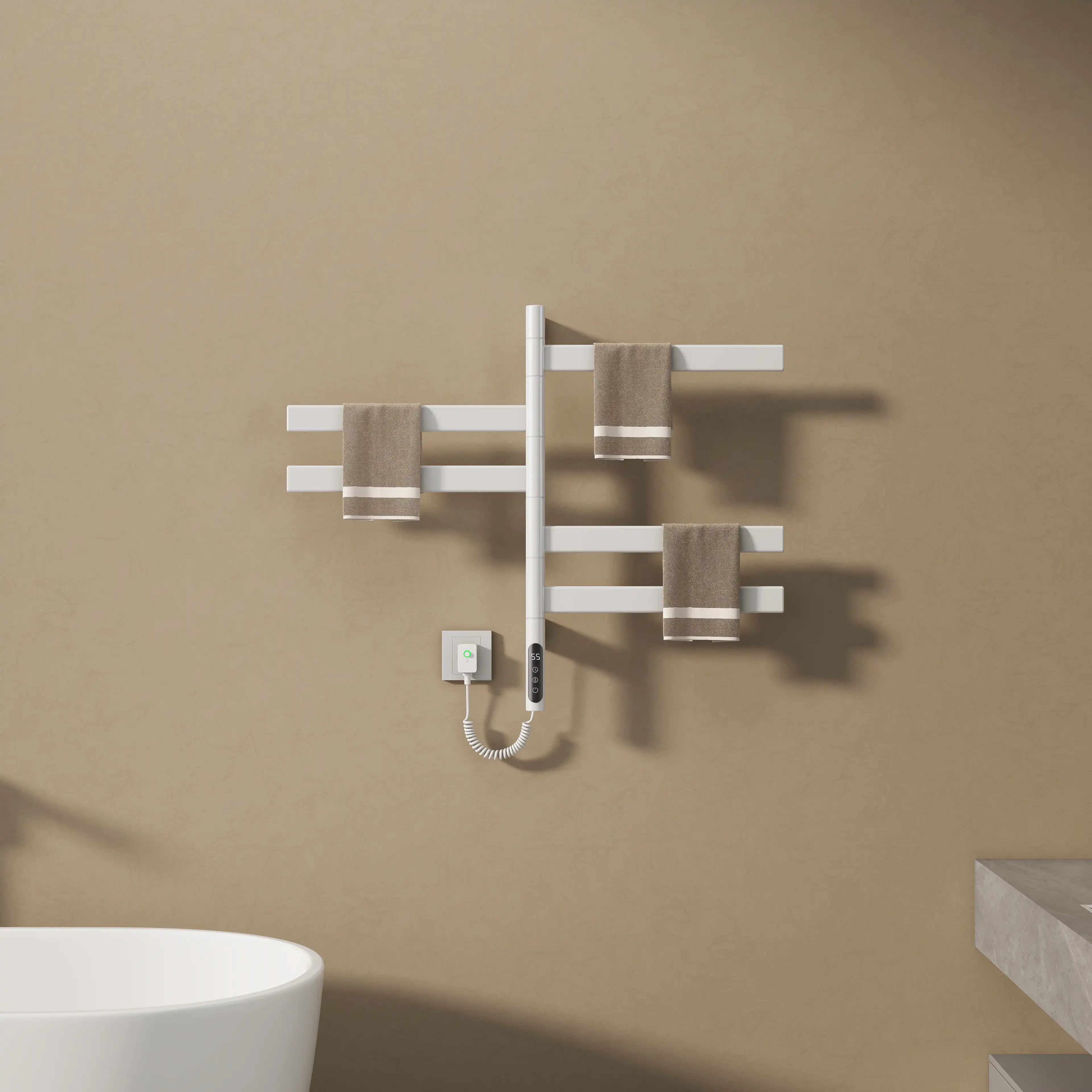 White heated towel rail radiator mounted on bathroom wall with brown towels neatly hung.