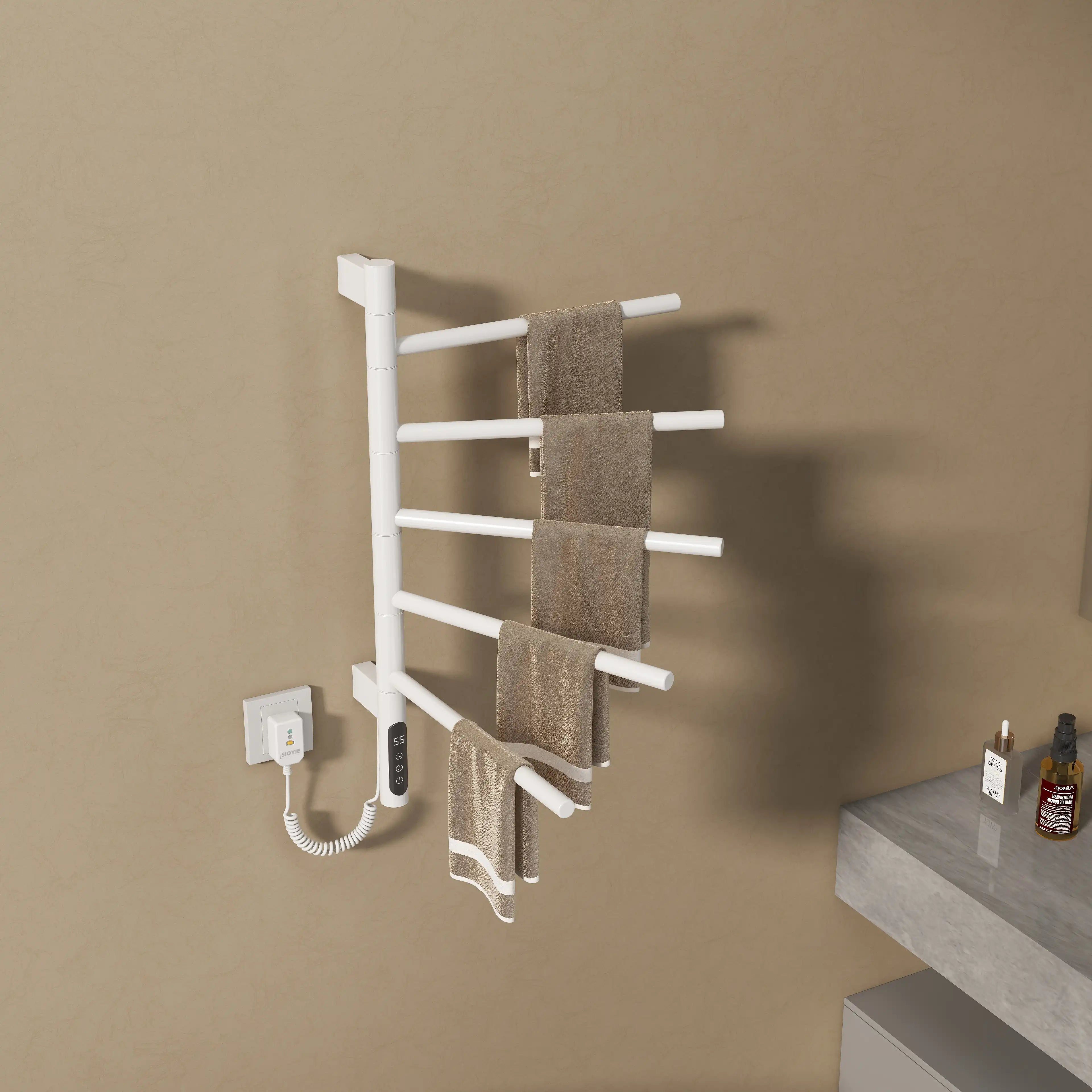White Orven Series towel rack heater 16 x 27 with multiple towels hanging on rotating bars | Ace Decor
