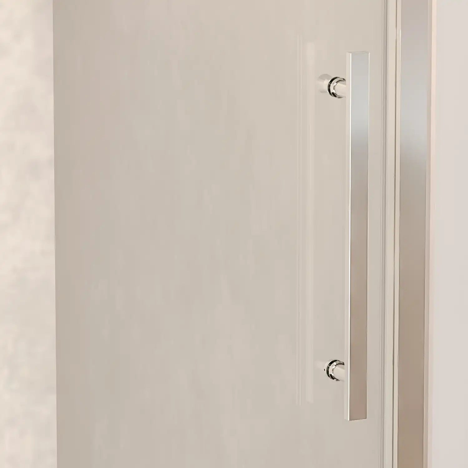 Close-up of Brivio chrome sliding shower door with sleek stainless steel handle.