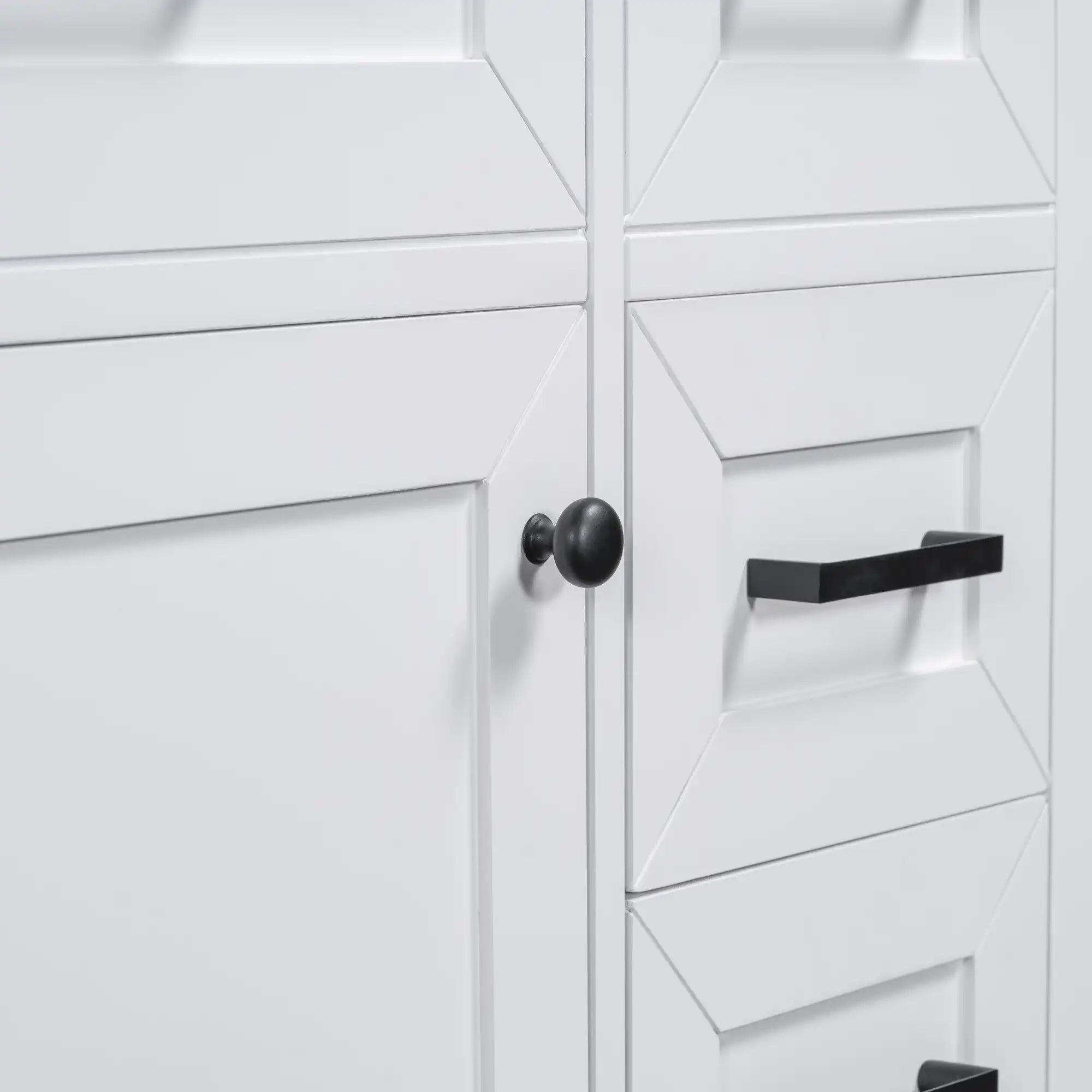 Elmsford Series 30" freestanding bathroom vanity with black metal handles.