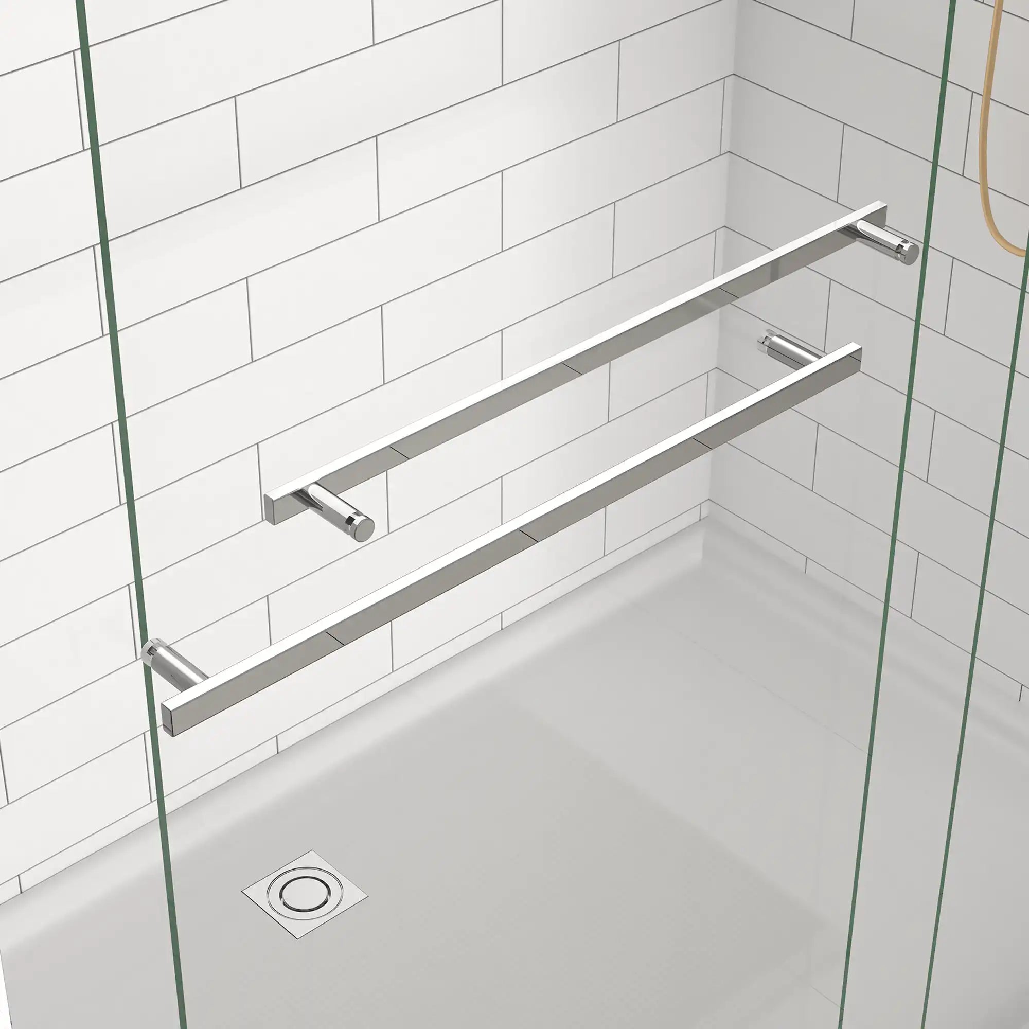 Chrome handle detail on 60 x 70 framed glass shower door in a tiled shower space | Ace Decor