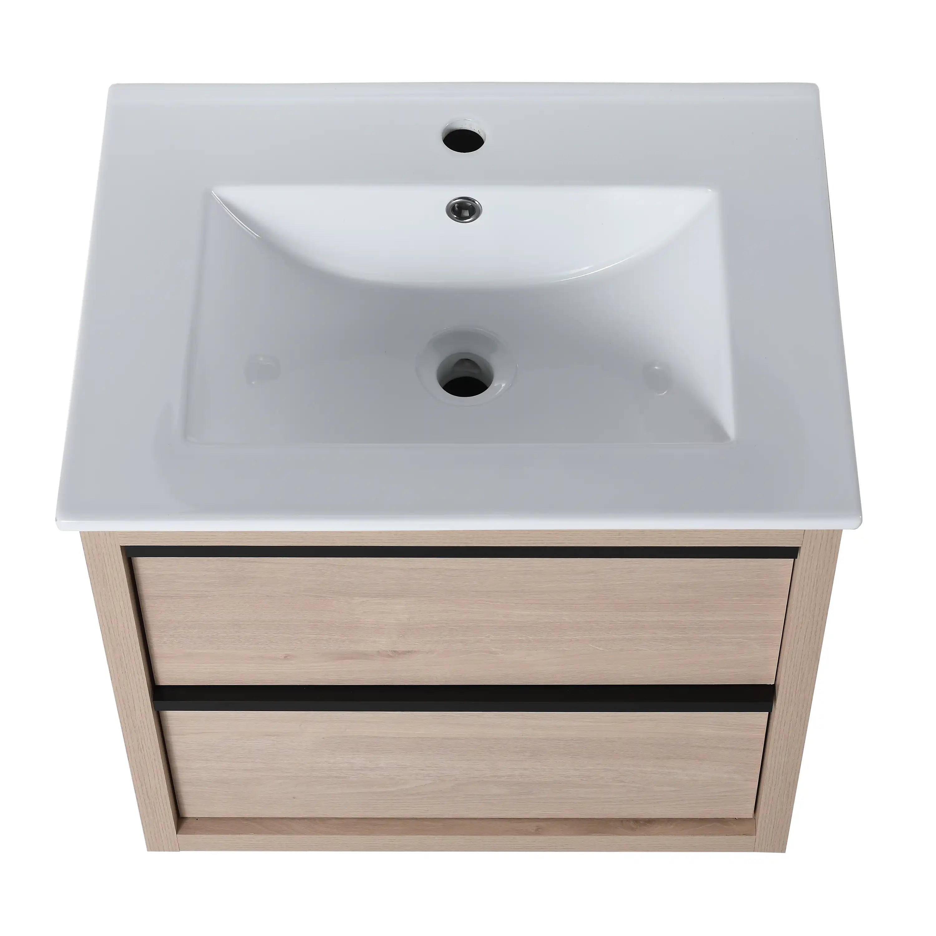Matte black metal handle on 24" bathroom wall mount vanity.