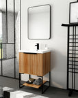 Freestanding 24 inch bathroom vanity with sink styled in bright bathroom with glass partition | Ace Decor