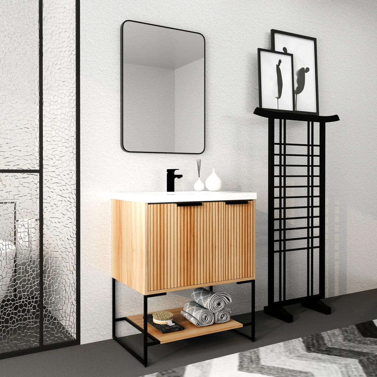 Striata freestanding 30-inch bathroom vanity in a modern bathroom with black frame mirror and fixtures.