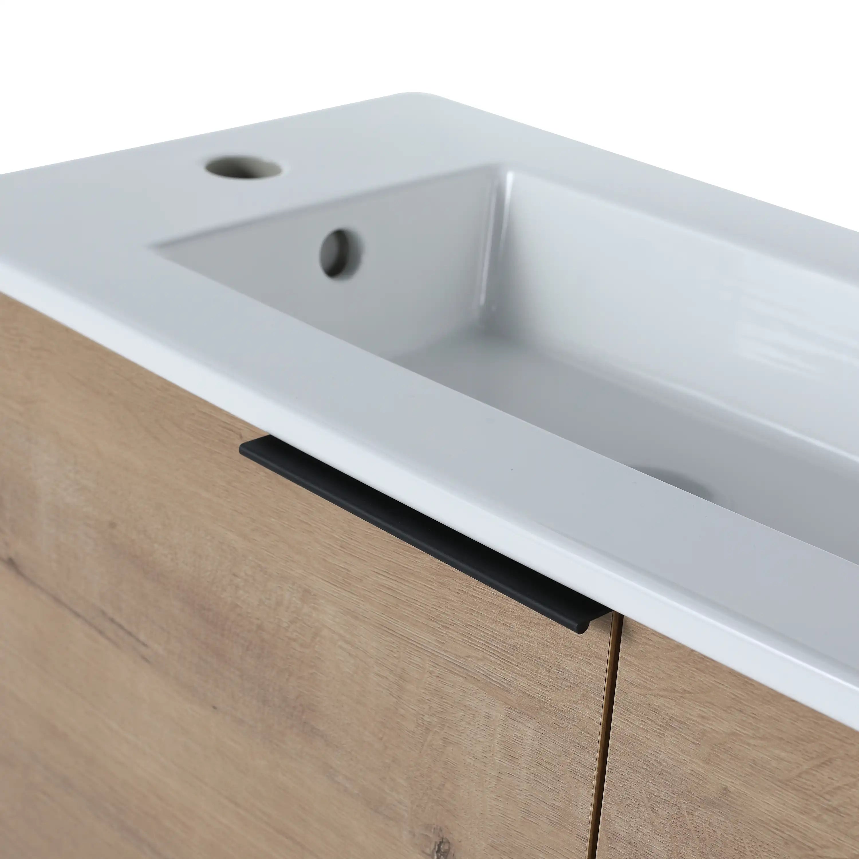 Black metal handle detail of the Forma Series 22 inch bathroom floating vanity.