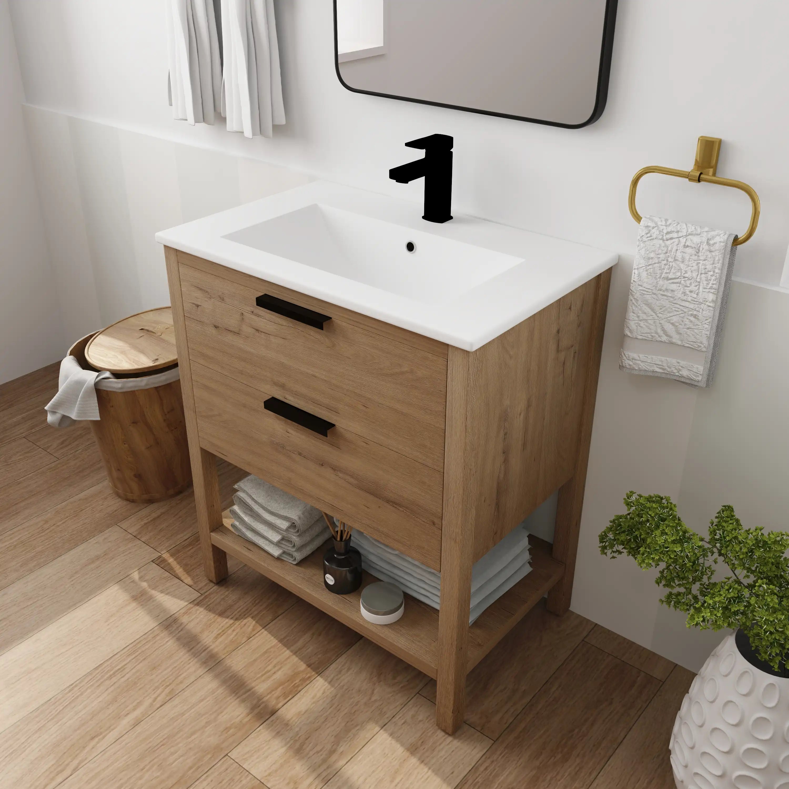 30" freestanding single bathroom vanity in bathroom with black faucet.