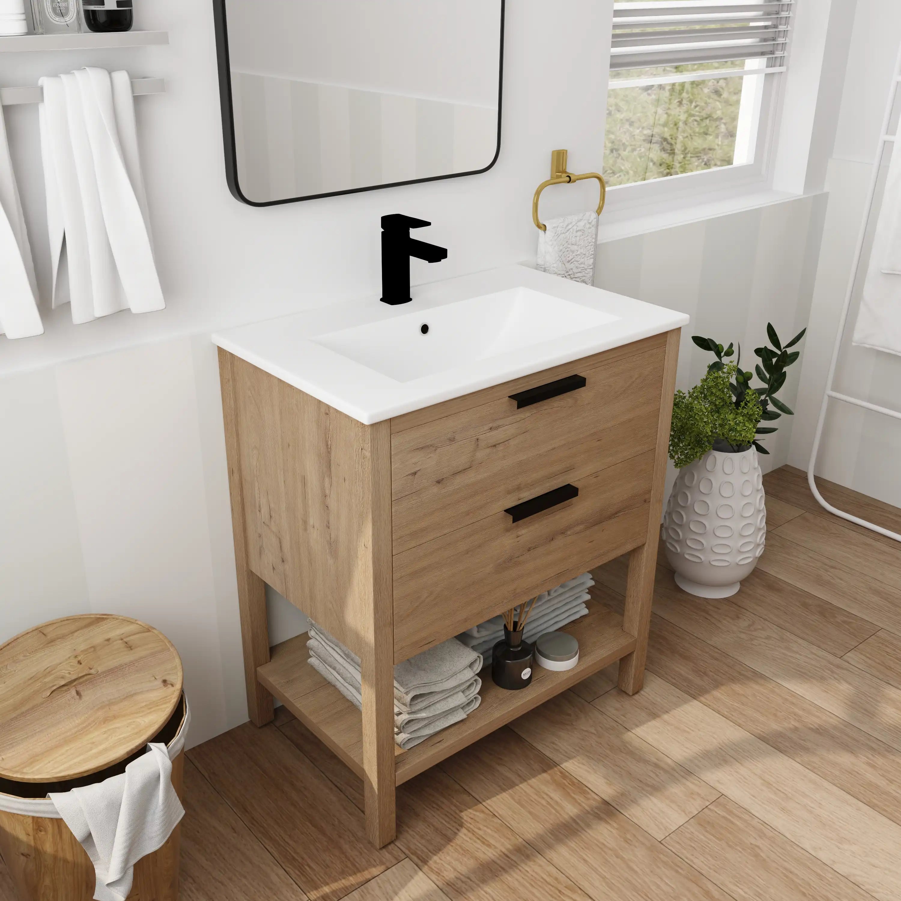 Angle view of the 30" freestanding single bathroom vanity styled in a modern bathroom setting.