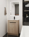 Modern bathroom scene featuring a 24" 24in bathroom vanity with integrated sink and freestanding design | Ace Decor