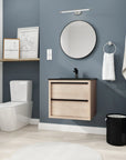 24" wall mounted bathroom vanity in light oak with black sink, styled in modern bathroom setting | Ace Decor