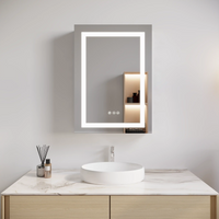 Wall-mounted Hawley 26 inch LED light mirror bathroom cabinet above white sink.