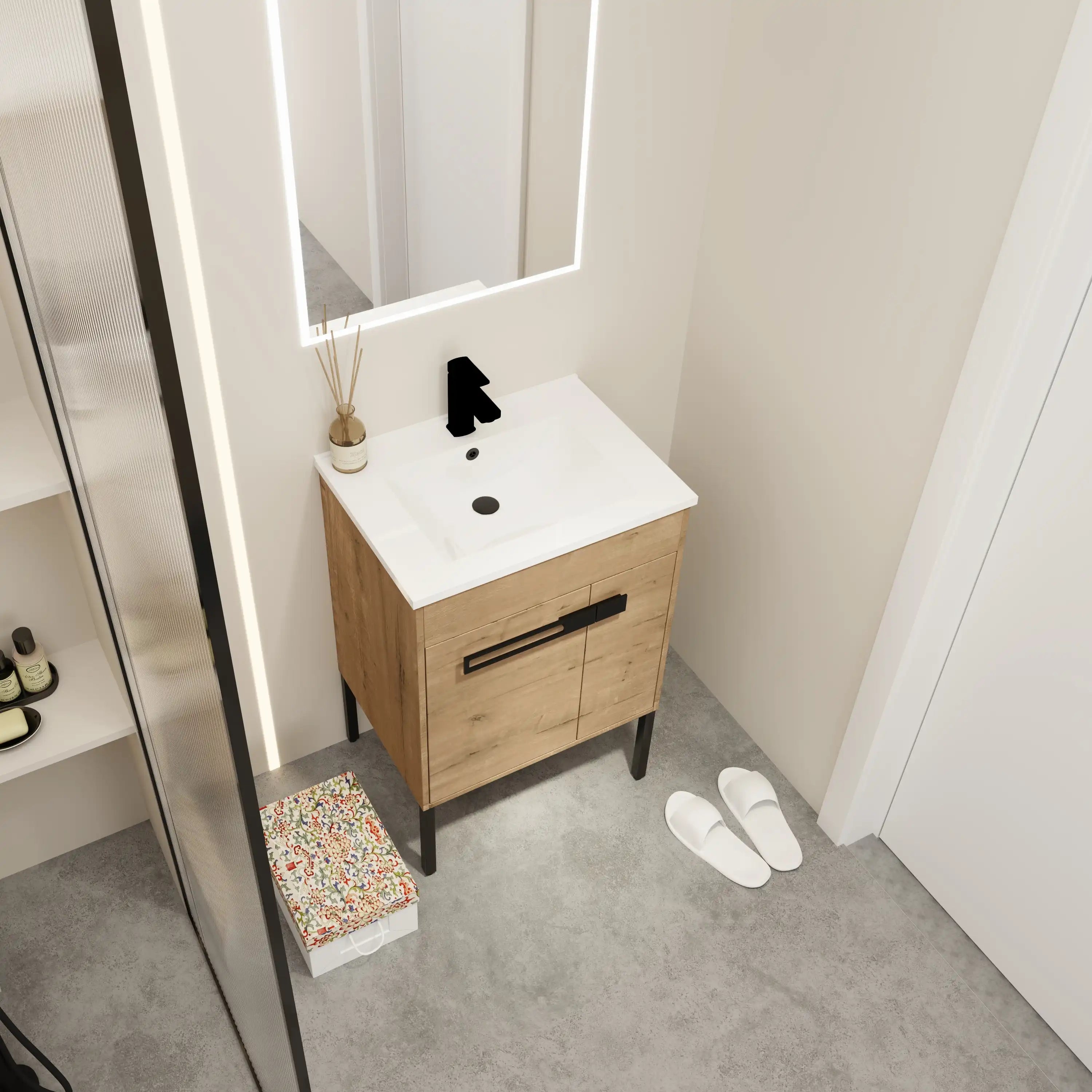24" freestanding bathroom vanity with sink styled in a compact modern bathroom setting.