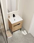 24" freestanding bathroom vanity with sink styled in a compact modern bathroom setting | Ace Decor