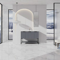 48" freestanding bathroom vanity with resin sink and open shelf in a hotel-like bathroom.