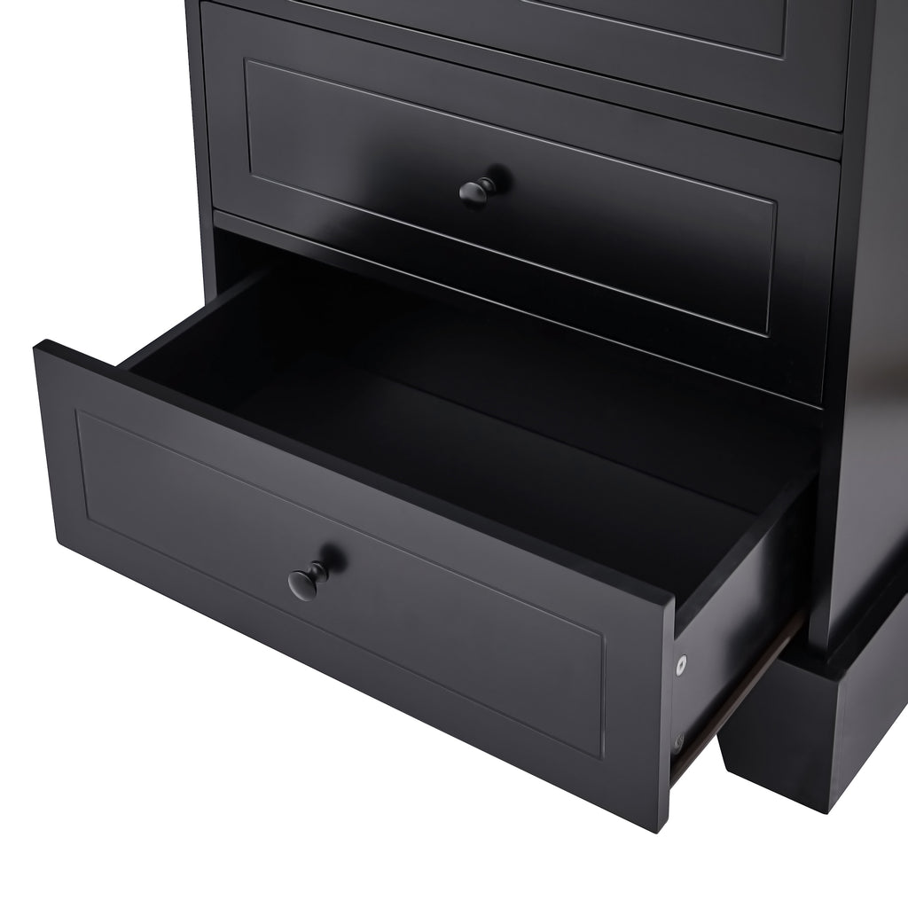 Deep drawer of black bathroom linen cabinet pulled open, highlighting generous storage depth.