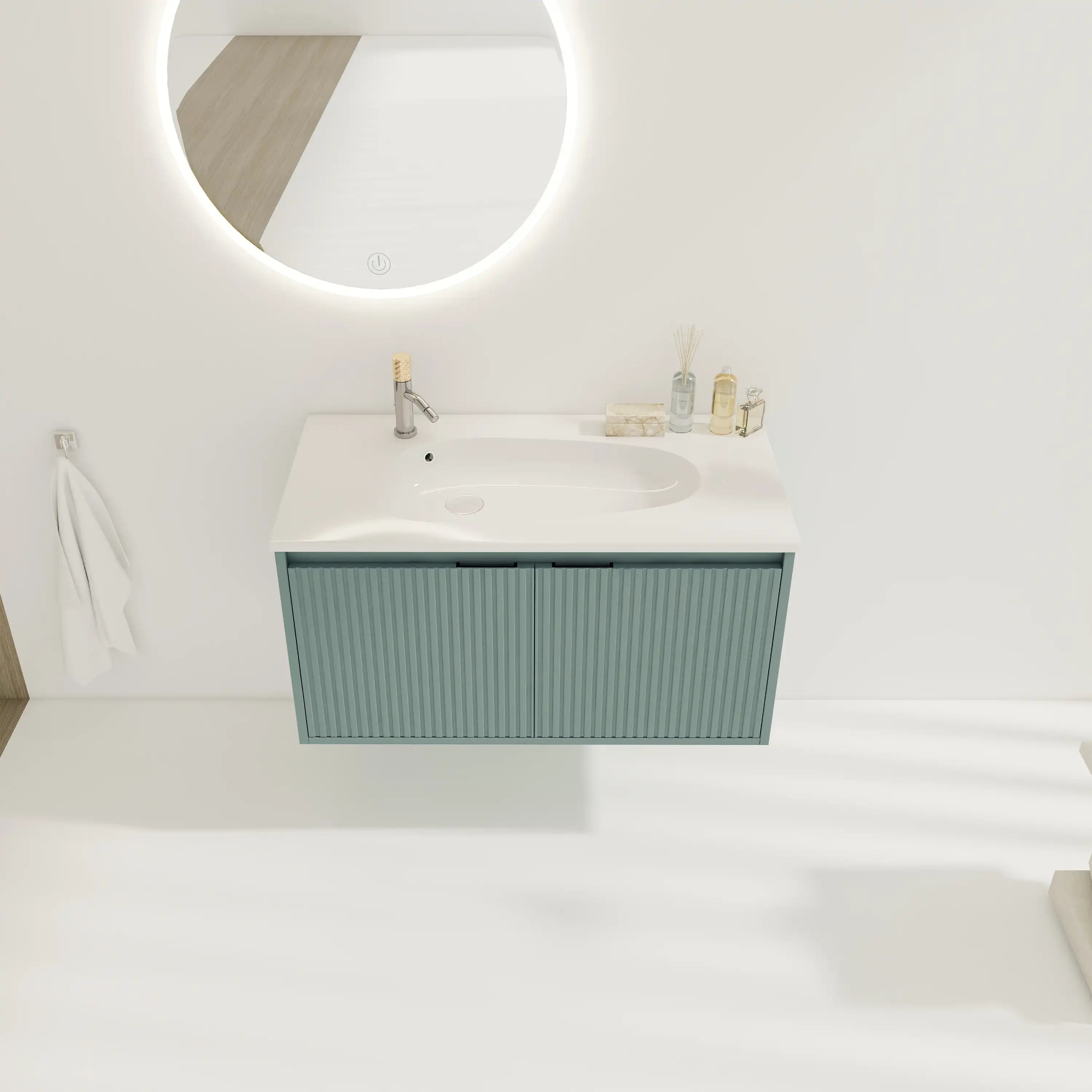 Front view of 36" sage green floating vanity with fluted doors in a modern bathroom.