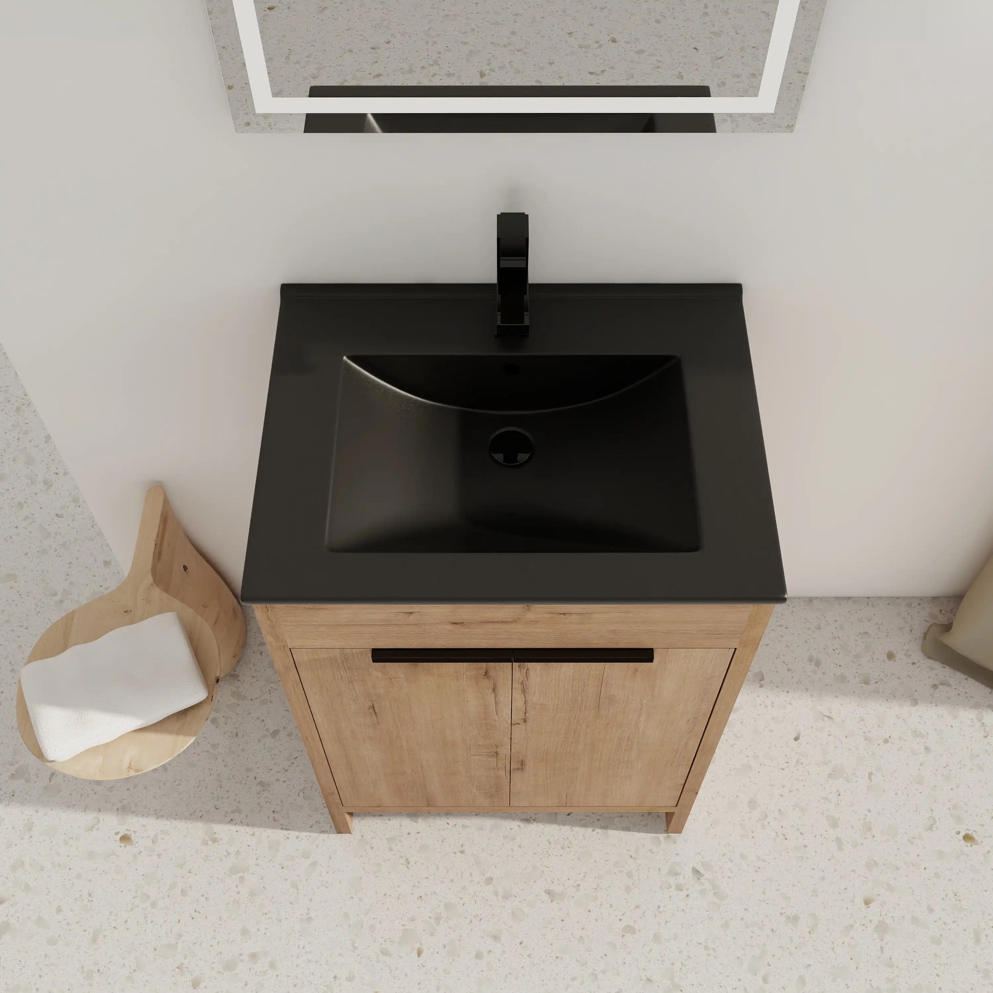 Top-down view of 24" black bathroom sink vanity with integrated matte black basin | Ace Decor