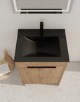 Top-down view of 24" black bathroom sink vanity with integrated matte black basin | Ace Decor