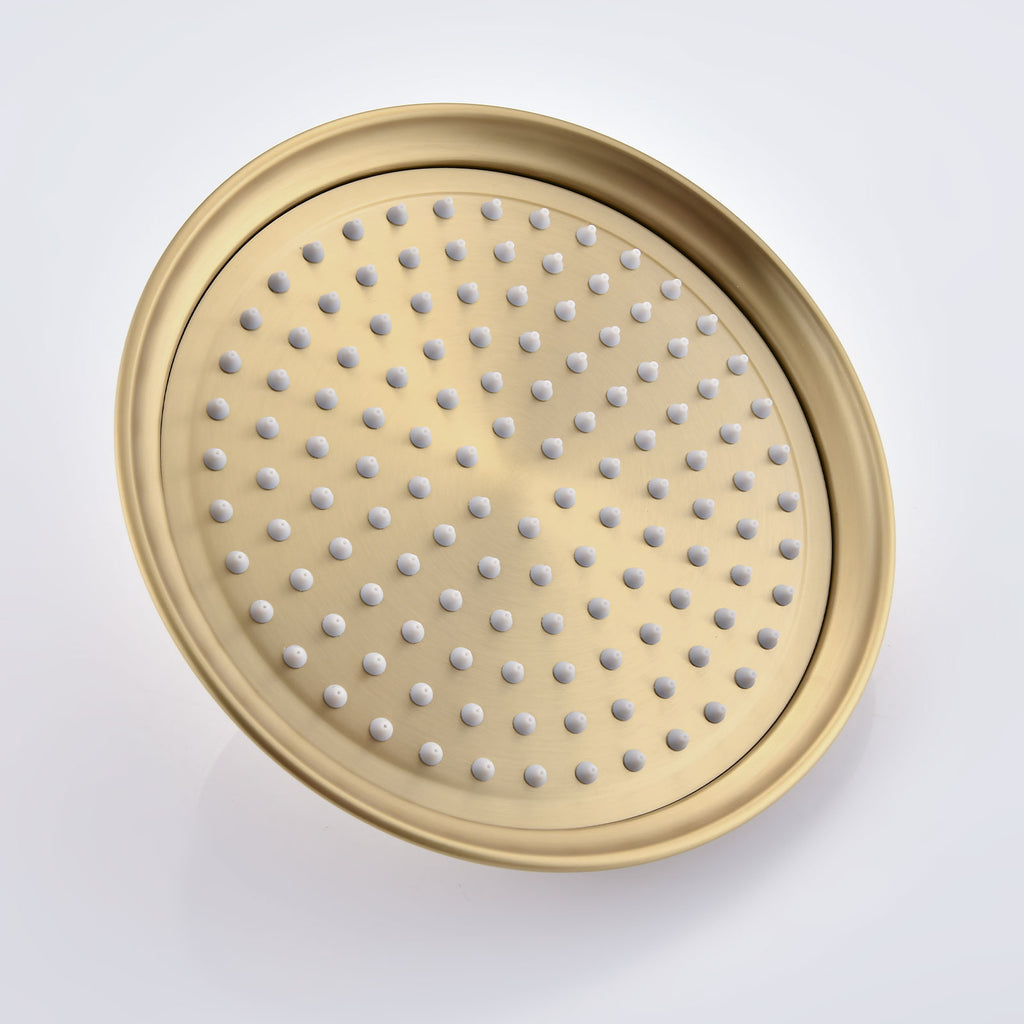 Avelar 9-inch brushed gold rain shower head with soft rubber spray holes for easy cleaning.