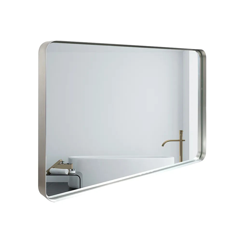 Lunare brushed silver rounded rectangle bathroom mirror shown from a side angle with aluminum frame and beveled edge.
