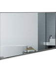 Noir Series black metal frame mirror on white background, reflecting a modern bathroom with bathtub, vanity, and gray subway tile.