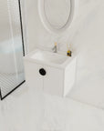 28 inch small floating vanity with black handle in a clean modern bathroom | Ace Decor