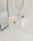 Bathroom scene featuring 28 inch small floating vanity with brass handle | Ace Decor