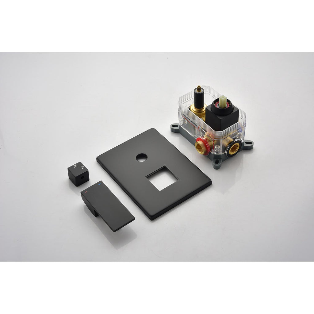 Disassembled shower valve with internal components and matte black control trim