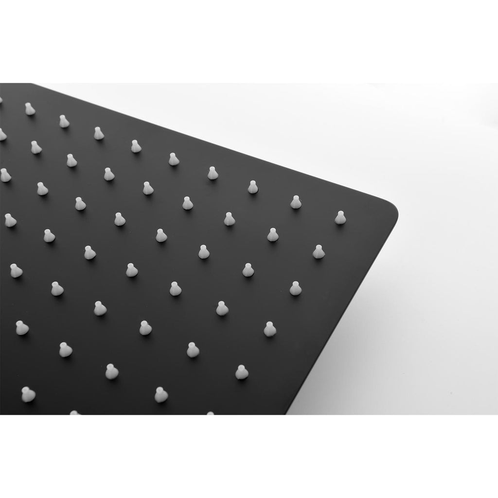 Close-up of the Eclipse Series matte black 12-inch square rainfall shower head with silicone nozzles