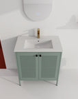 Front view of 30" mint green 30 inch bathroom vanity with legs with ceramic sink and gold faucet | Ace Decor