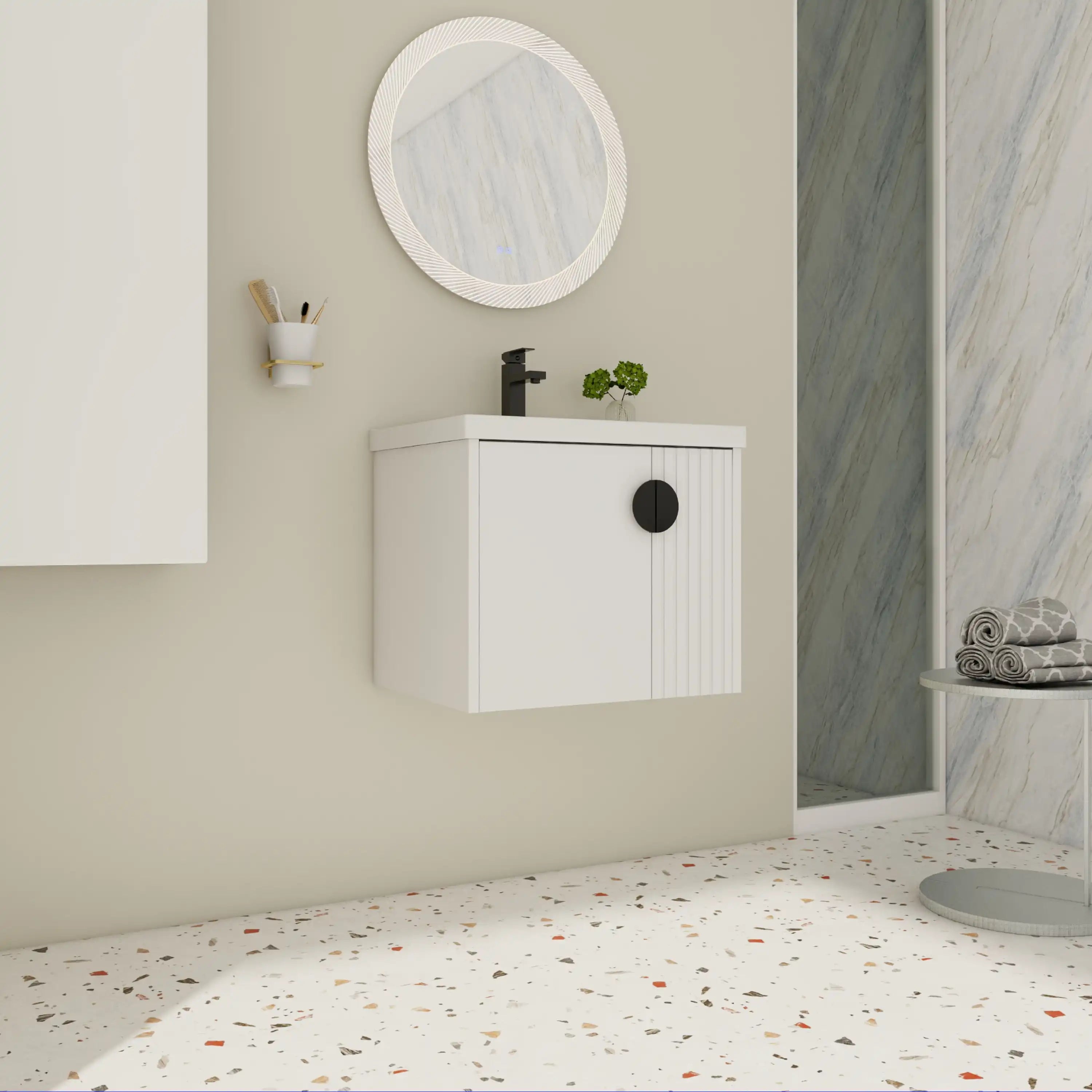 Wall-mounted white bathroom vanity 24 inch installed in modern bathroom setting.