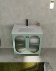 Styled bathroom scene with 30" mint green freestanding single bathroom vanity with sink and fluted acrylic doors | Ace Decor