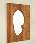 Full view of a wood vanity mirror with a solid rosewood frame and clear reflective surface.