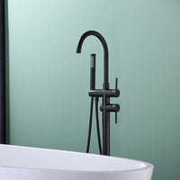 "Freestanding Black Tub Faucet with Handheld Shower installed beside bathtub, modern matte black finish for contemporary bathrooms.
