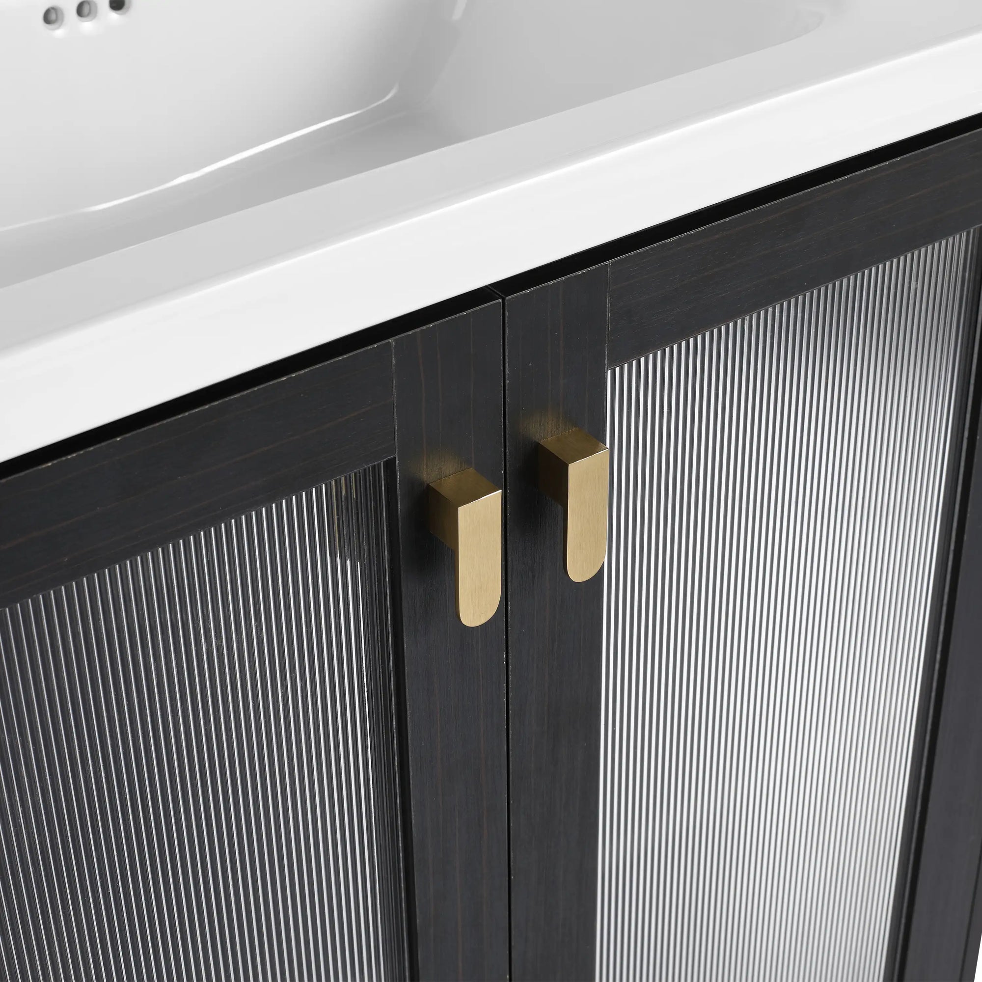 Hudson Reed 28" freestanding bathroom vanity with  gold metal handle close-up view.