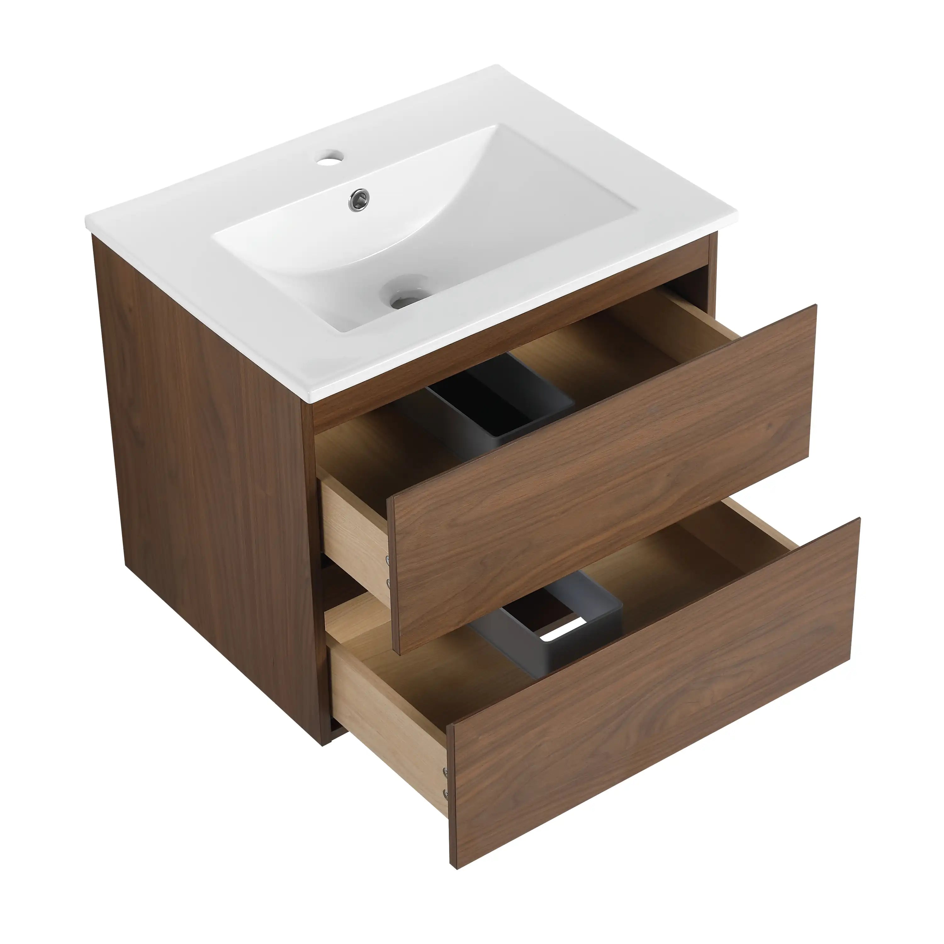 24 inch bathroom vanity with ceramic sink detail and  drawers open, angled view.