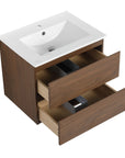 24 inch bathroom vanity with ceramic sink detail and  drawers open, angled view.