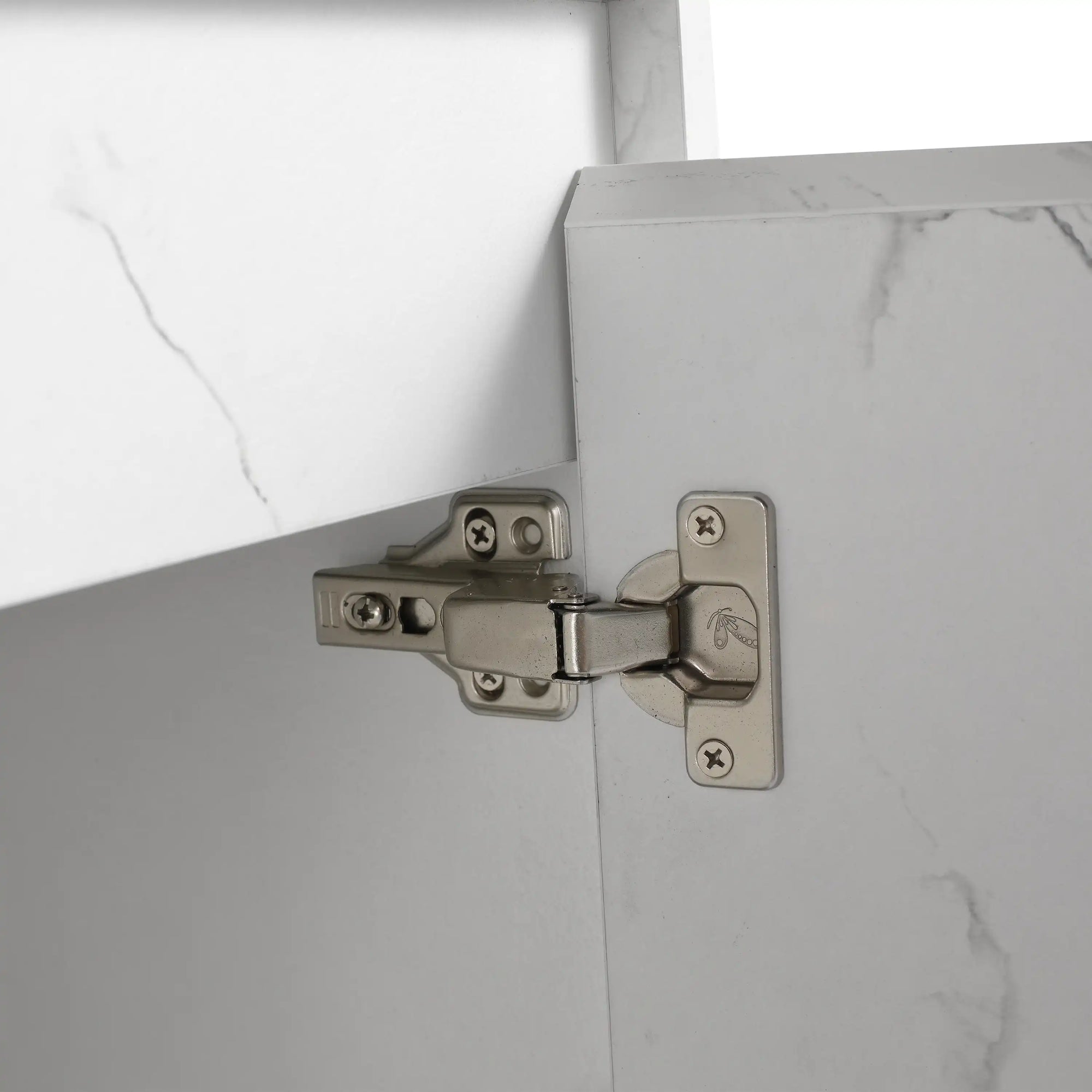 Soft-close cabinet hinge detail on ArborEdge floating bathroom vanity.