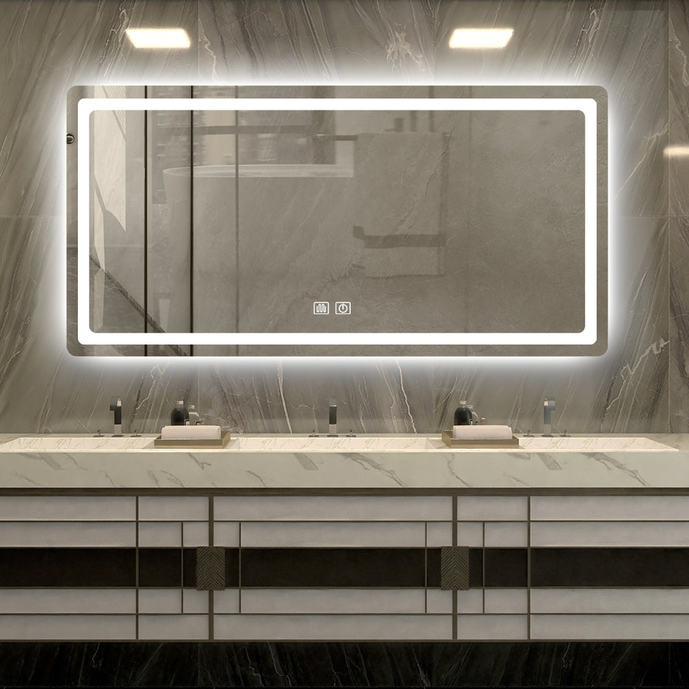 A modern double-sink bathroom setup featuring a sleek rectangular mirror with LED lights for bathroom mirror use, glowing softly against a marble wall backdrop.