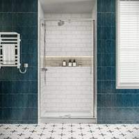 Front view of 36 x 72 pivot shower door with clear tempered glass in a modern tiled bathroom.
