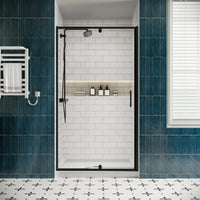 Front view of 36 x 72 pivot shower door with clear tempered glass and matte black frame in a modern bathroom.