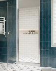 P103 Zerra Semi-Frameless Pivot Shower Door Closed in a Modern Bathroom.